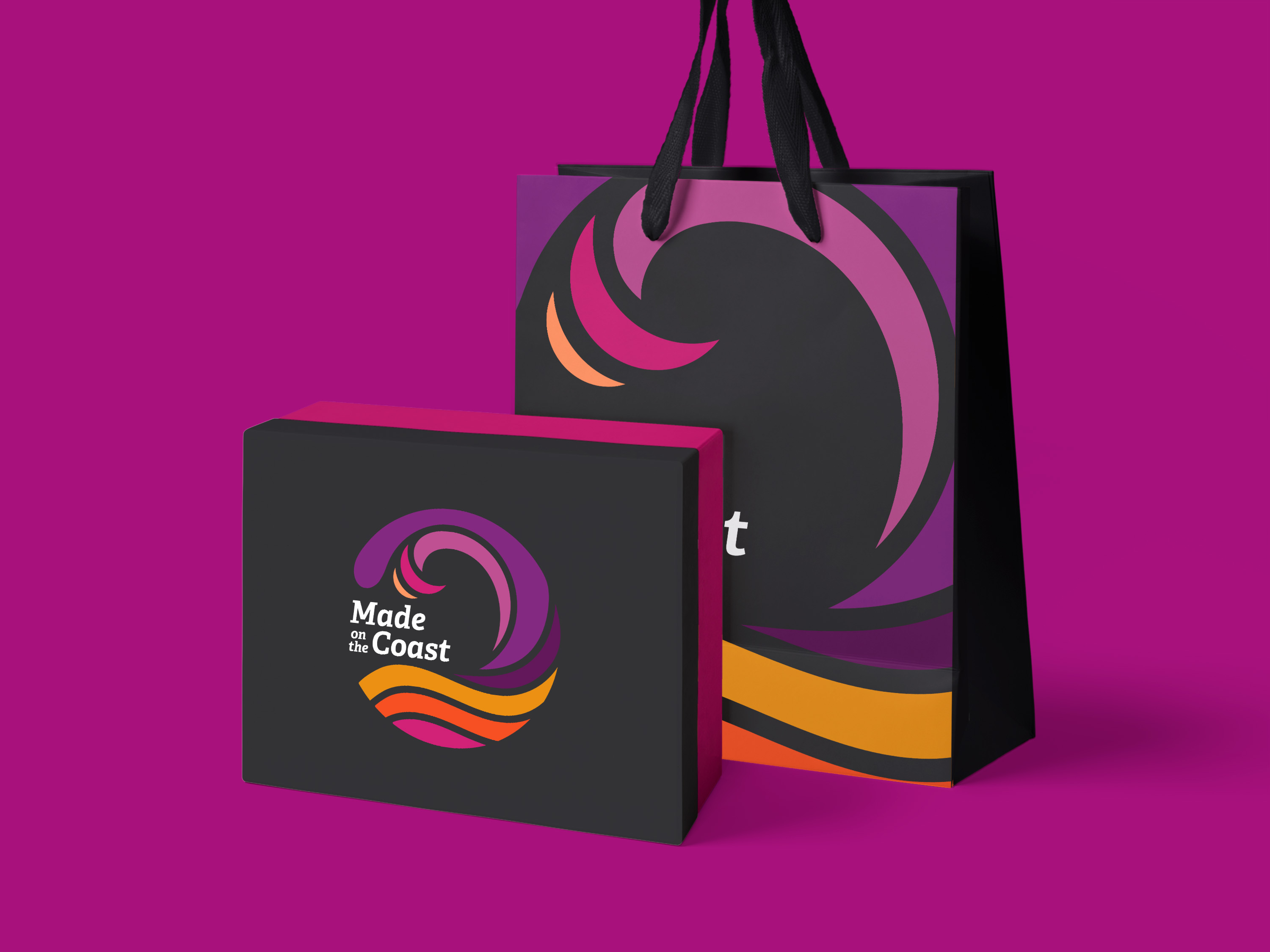 Made on the Coast logo on shopping bag and box